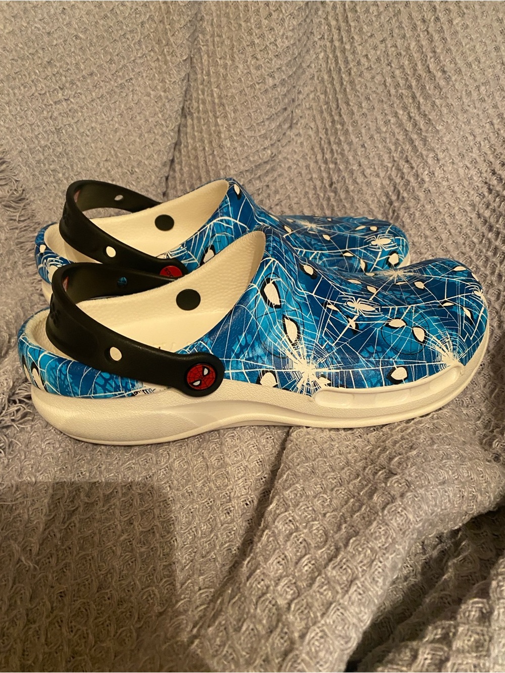 CROCS Blue Spider-Web Print Clogs with Black Strap. Men’s size 8 women’s 10